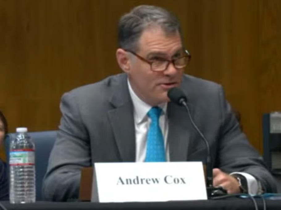 Andrew Cox delivering his testimony to the commission.
