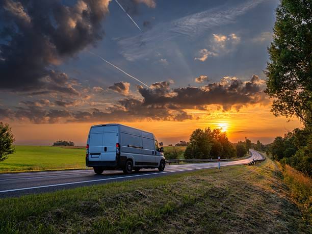 White fast delivery van driving on the asphalt road in rural landscape at golden sunset with dramatic clouds White fast delivery van driving on the asphalt road in rural landscape at golden sunset with dramatic clouds delivery car stock pictures, royalty-free photos & images White fast delivery van driving on the asphalt road in rural landscape at golden sunset with dramatic clouds White fast delivery van driving on the asphalt road in rural landscape at golden sunset with dramatic clouds delivery car stock pictures, royalty-free photos & images