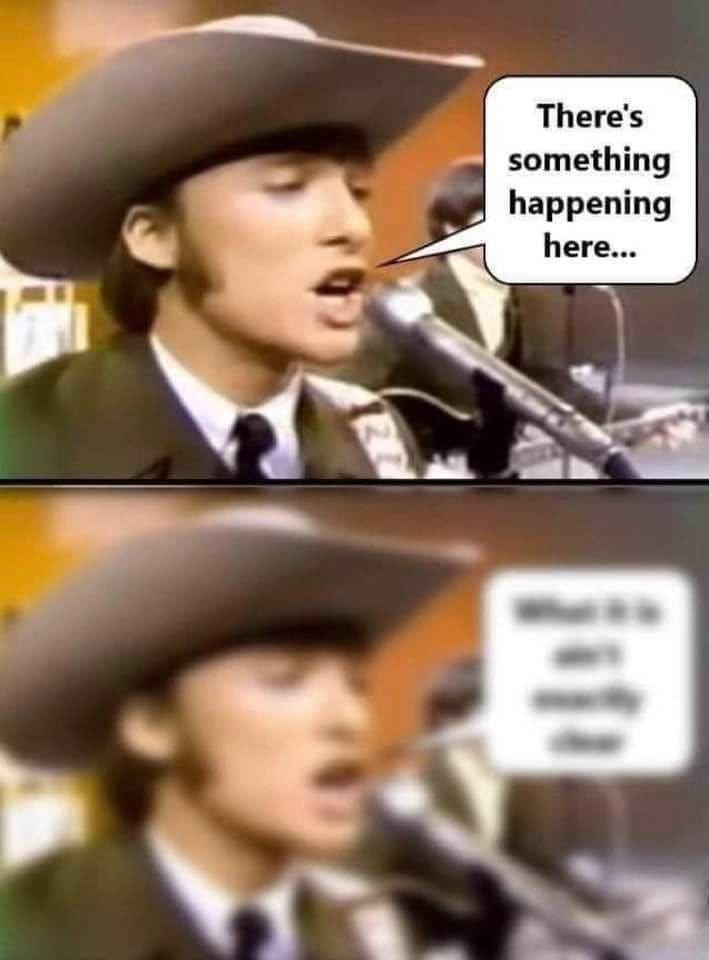 May be an image of 2 people and text that says 'There's something happening here... 1'