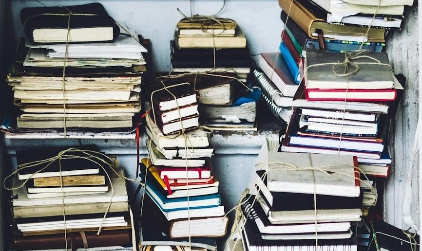 closeup photo of assorted-color book lot