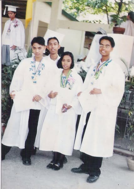 photo of high school students after graduation