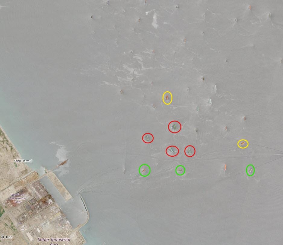 Ships transferring oil cargo off the coast of Oman Ships transferring oil cargo off the coast of Oman