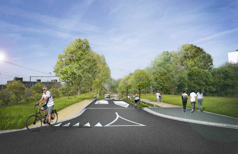 Visuel du projet de la rue Wagon. On y voit l'entrée de la rue avec deux trous qui empêchent aux automobilistes de passer. Il y a également une piste cyclable sur le côté gauche. Les bors sont très verts, on y voit des caténaires de trains à gauche de l'image. Visuel du projet de la rue Wagon. On y voit l'entrée de la rue avec deux trous qui empêchent aux automobilistes de passer. Il y a également une piste cyclable sur le côté gauche. Les bors sont très verts, on y voit des caténaires de trains à gauche de l'image.