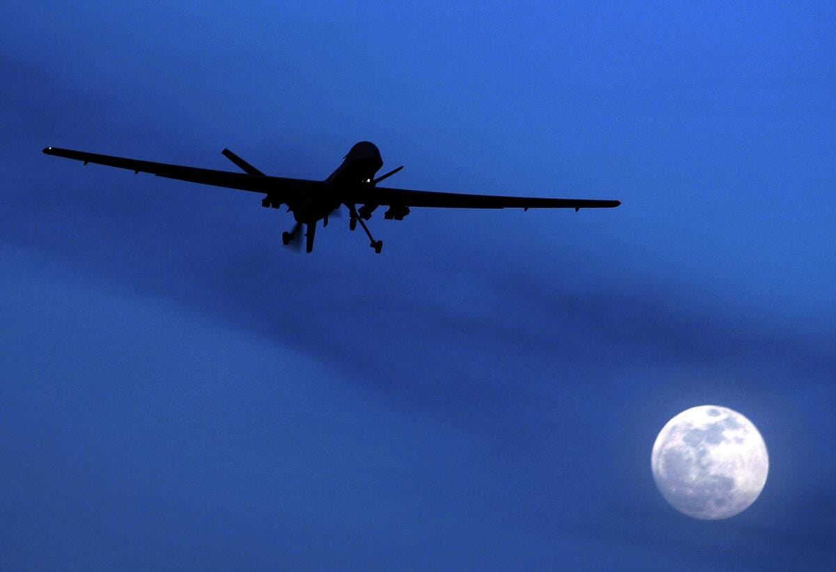 An unmanned Predator drone flies over Kandahar Air Field in southern Afghanistan in 2010.