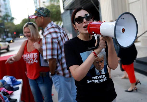 Laura Loomer shows her support for former President Donald Trump outside a campaign event for Republican presidential candidate Florida Gov. Ron DeSantis at The Vault on October 05, 2023 in Tampa, Florida. (Photo by Joe Raedle/Getty Images)