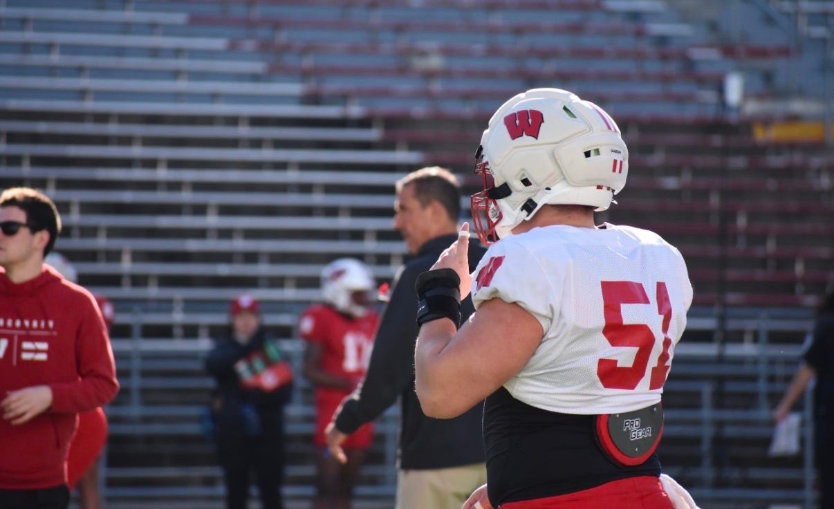 Wisconsin Badgers center Austin Kawecki on the field during a fall camp practice. Wisconsin Badgers center Austin Kawecki on the field during a fall camp practice.