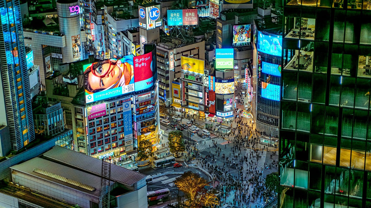 Shibuya Crossing — Shibuya Crossing, aerial view. David Kernan / CC BY 4.0, via Wikimedia Commons Shibuya Crossing — Shibuya Crossing, aerial view. David Kernan / CC BY 4.0, via Wikimedia Commons