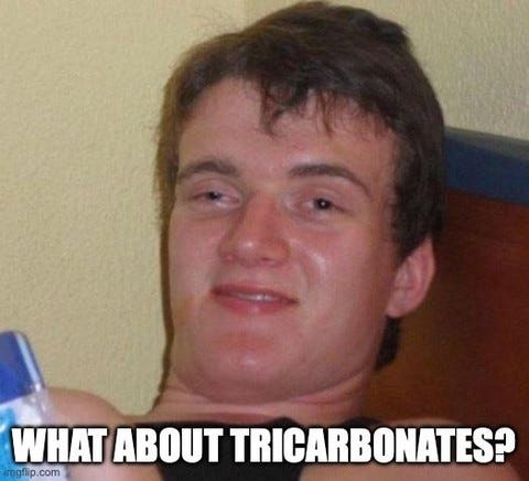 A grinning, glassy-eyed young man captioned "What about tricarbonates?"