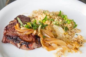 Grilled lamb with medjara rice