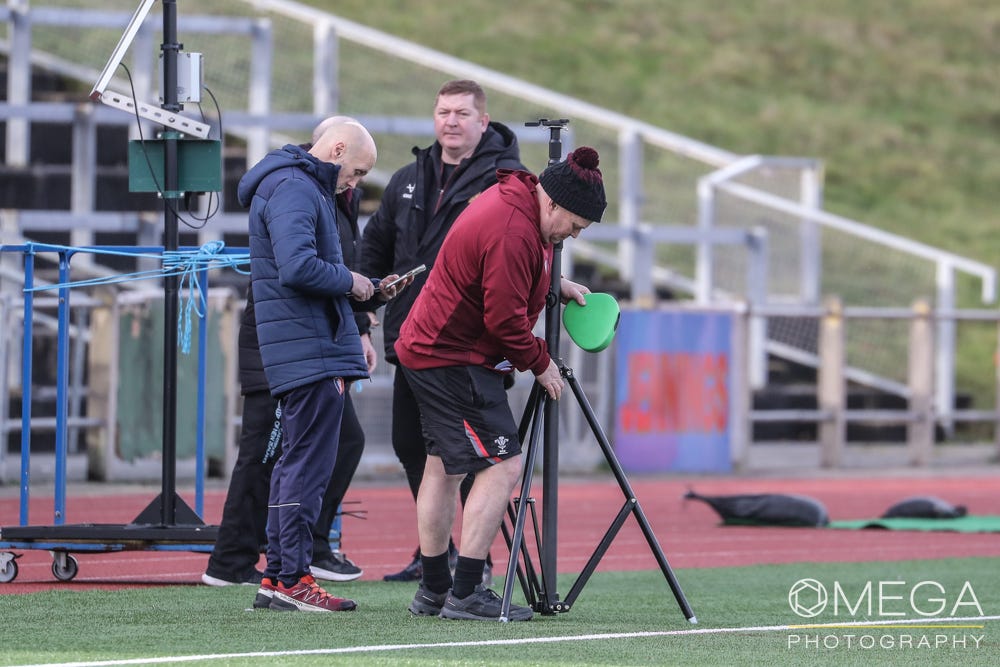 May be an image of American football and text that says "혜중 AИR OMEGA PHOTOGRAPHY"