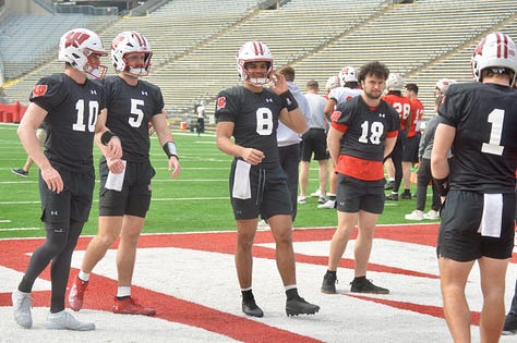 Wisconsin quarterbacks participate in individual position drills during Saturday's spring practice inside Camp Randall Stadium.
