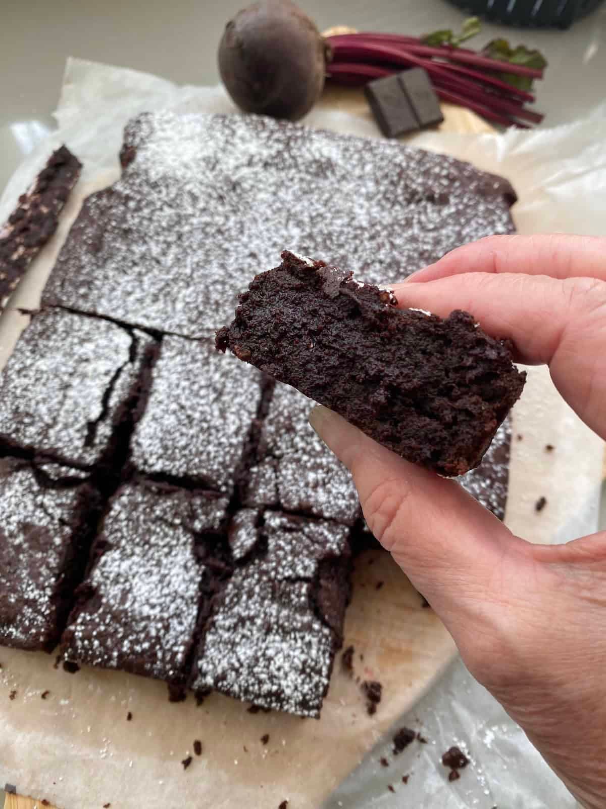 Beetroot and Chocolate brownies with slices cut out. Beetroot and Chocolate brownies with slices cut out.