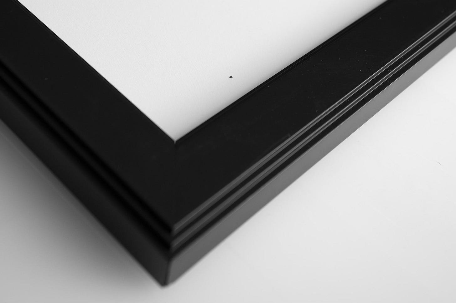 dirt behind glazing in finished print