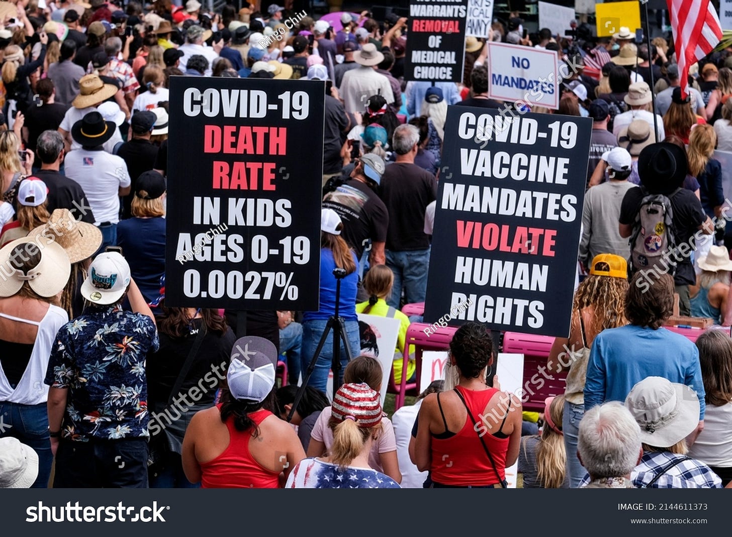 People attend at the Los Angeles "Defeat the Mandate" rally to protest vaccination mandates designed to slow the spread of COVID-19 in Grand Park in downtown Los Angeles Sunday, April, 10, 2022. 