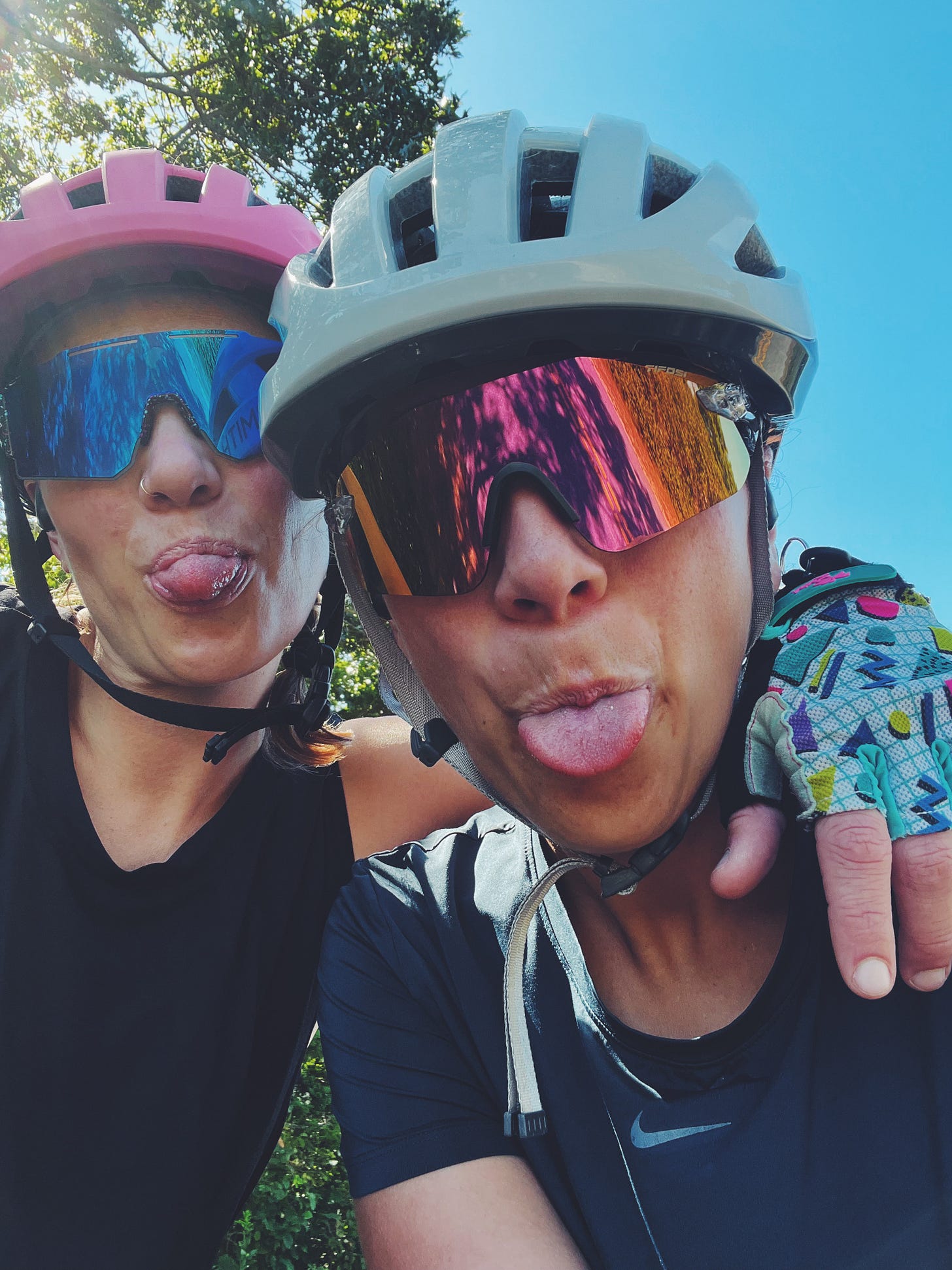 My wife and I mid bike ride, feeling hot in all the ways