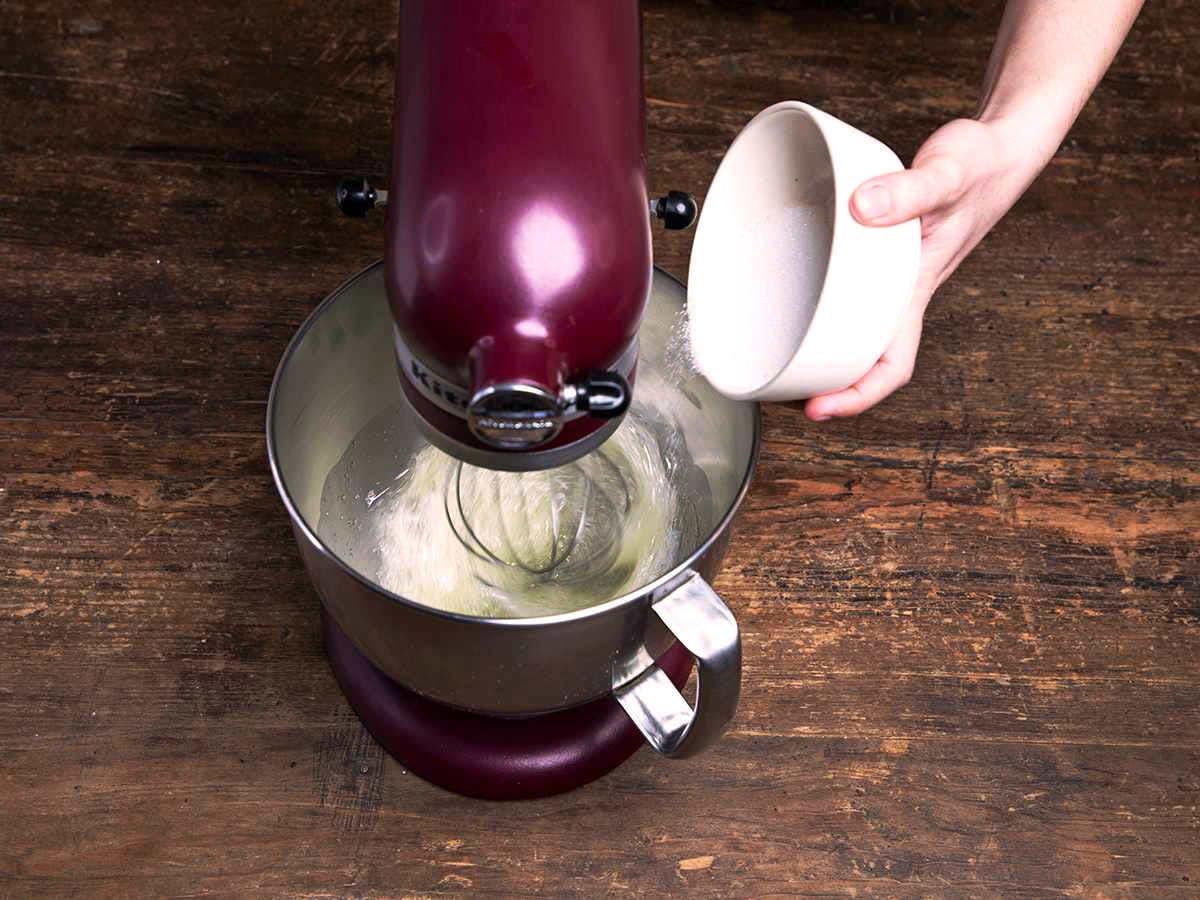 Adding sugar to egg whites in stand mixer