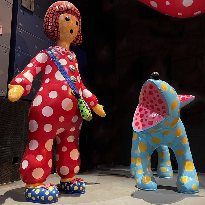 Photographs of giant inflatable doll, dog, and pink and black spotty inflatable art installations.