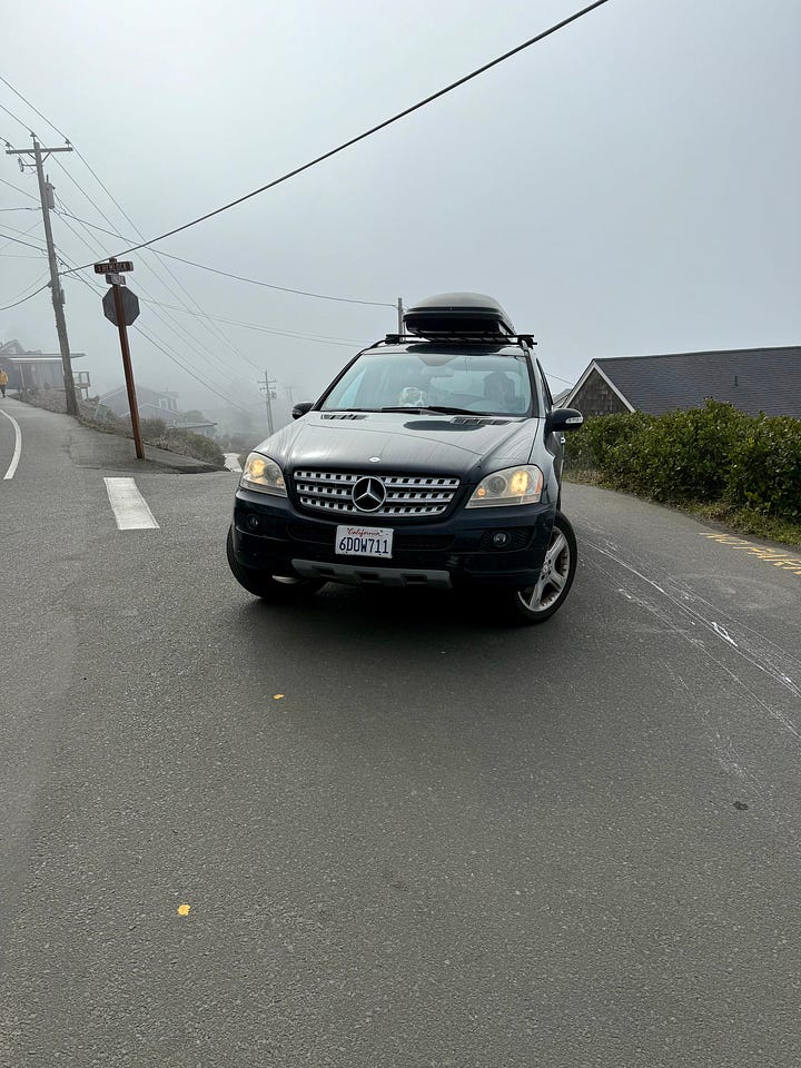 road trip car and view of the coast