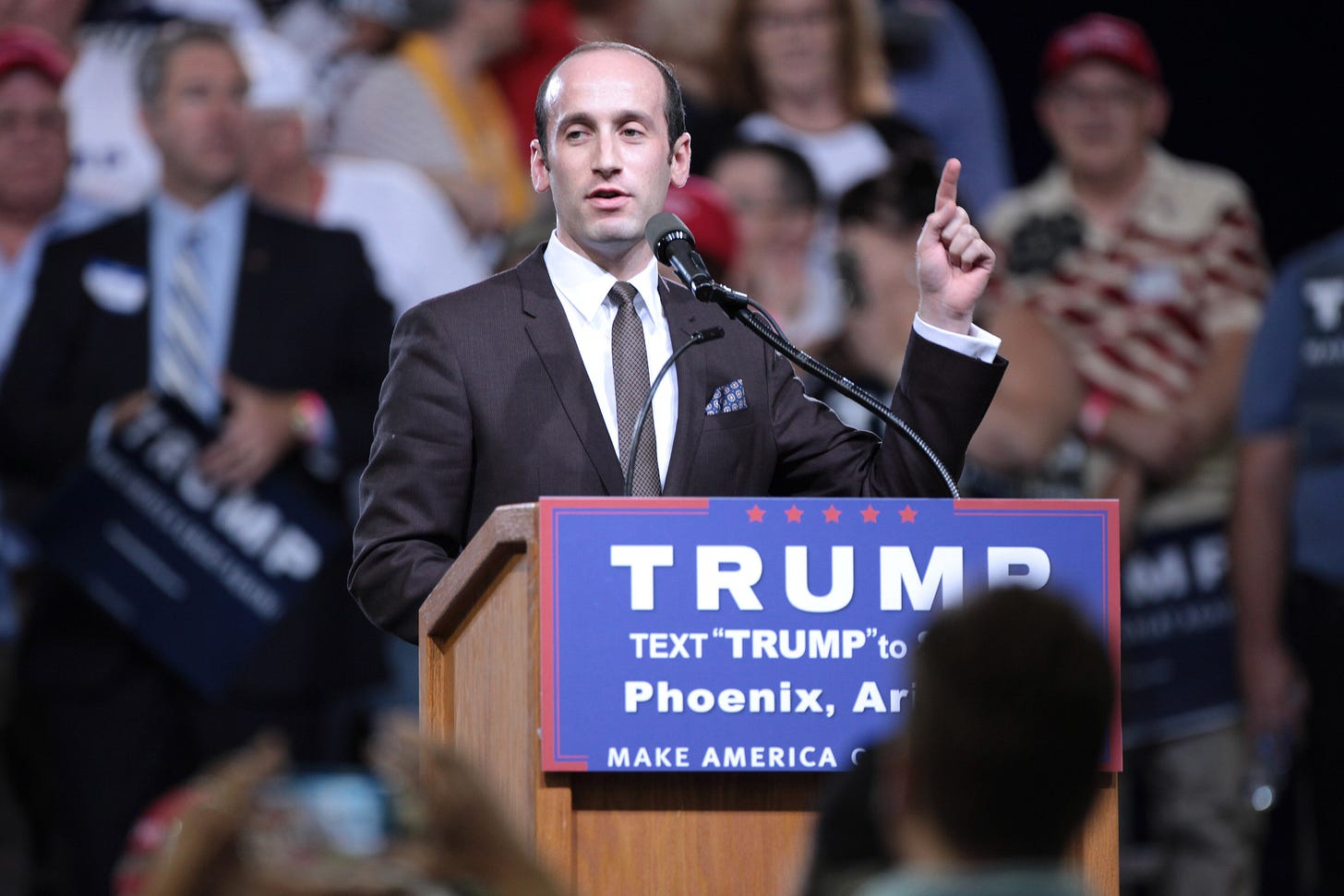 Stephen Miller speaking with supporters of Donald Trump at a 2016 rally at Veterans Memorial Coliseum at the Arizona State Fairgrounds in Phoenix, Arizona
