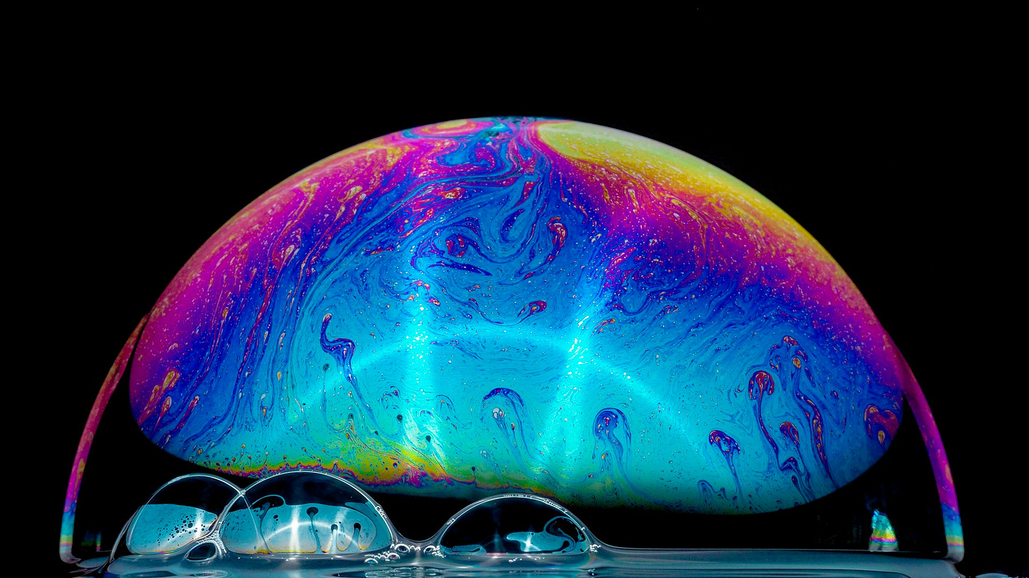 A soap bubble. A soap bubble.