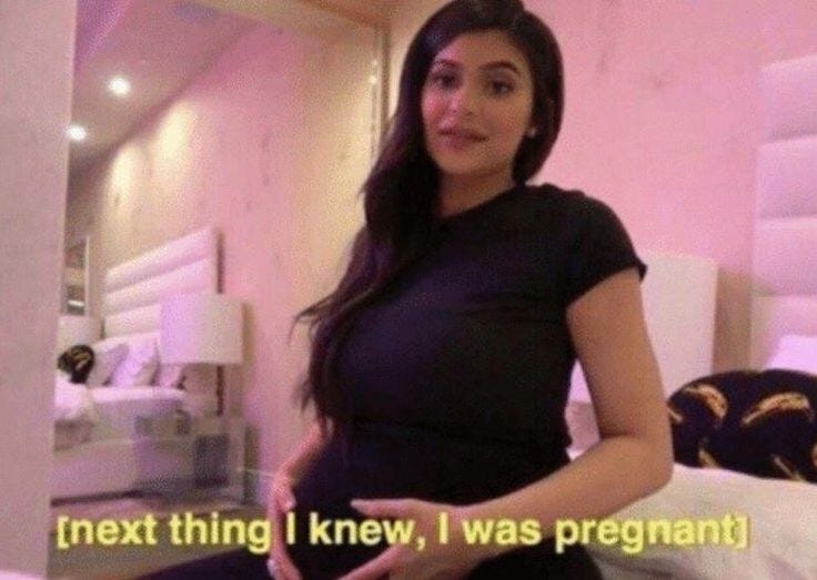 This may contain: a woman in a black dress standing next to a bed with the caption next thing i knew, i was pregnant This may contain: a woman in a black dress standing next to a bed with the caption next thing i knew, i was pregnant