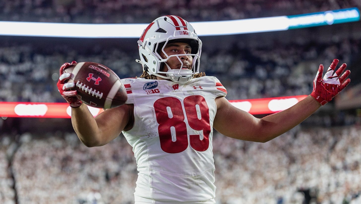 Wisconsin tight end Jacob Harris celebrates with the football after scoring the game-winning touchdown against Penn State. Wisconsin tight end Jacob Harris celebrates with the football after scoring the game-winning touchdown against Penn State.