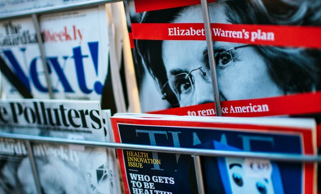 magazines displayed on a rack