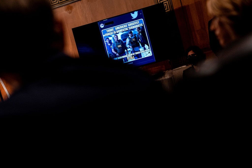 A tweet about the FBI is displayed during a US Senate Homeland Security and Governmental Affairs Committee hearing regarding social media's impact on homeland security on Capitol Hill in Washington, DC, on September 14, 2022. (Photo by Stefani Reynolds / AFP) (Photo by STEFANI REYNOLDS/AFP via Getty Images)