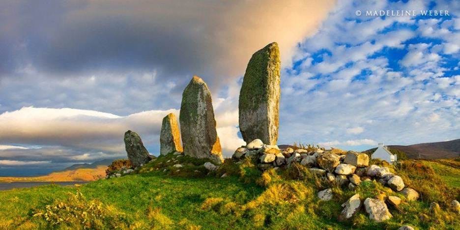 A group of rocks on a grassy hill
AI-generated content may be incorrect. A group of rocks on a grassy hill
AI-generated content may be incorrect.