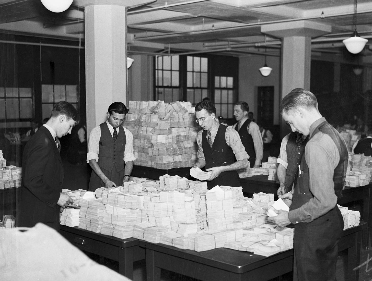 Employees at the Wage Records Office establish individual Social Security accounts for millions of workers, 1936. (Bettmann via Getty Images). Employees at the Wage Records Office establish individual Social Security accounts for millions of workers, 1936. (Bettmann via Getty Images).