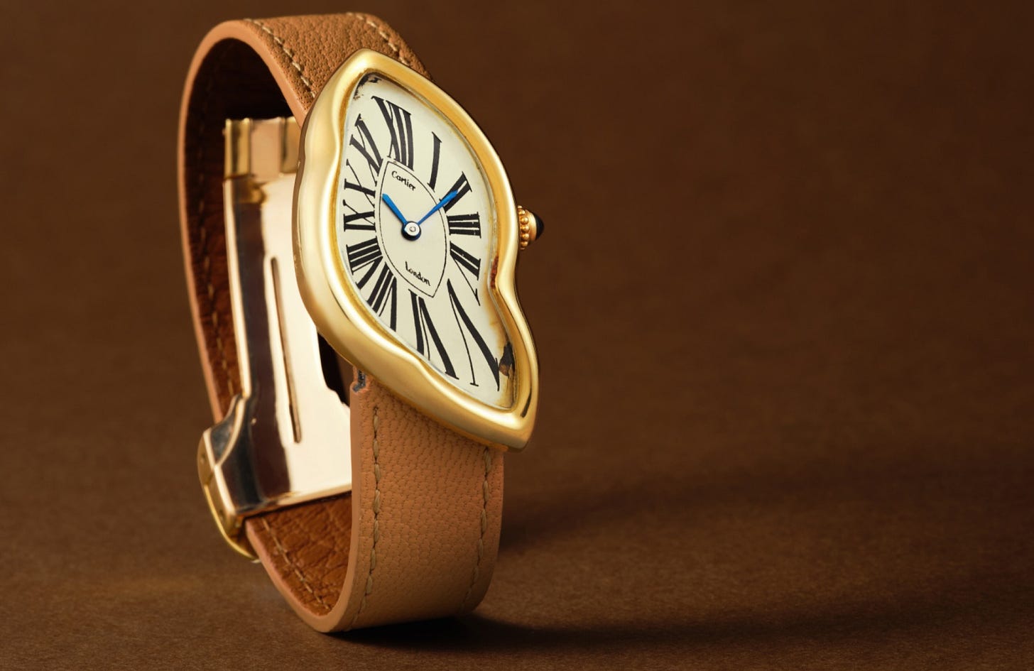 Cartier, London - Crash | A rare and iconic yellow gold distorted oval wristwatch, believed to be one of only three examples made in 1987
