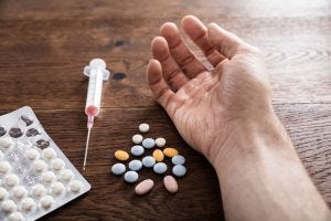 © Andriy Popov/ 123RF.com near death from Pills and IV drugs