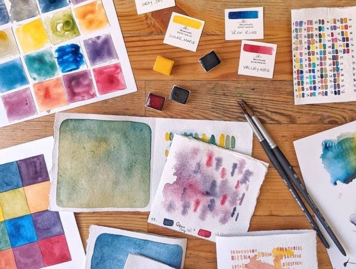 watercolor sketchbook with color mixing in the pages. watercolor sketchbook with color mixing in the pages.