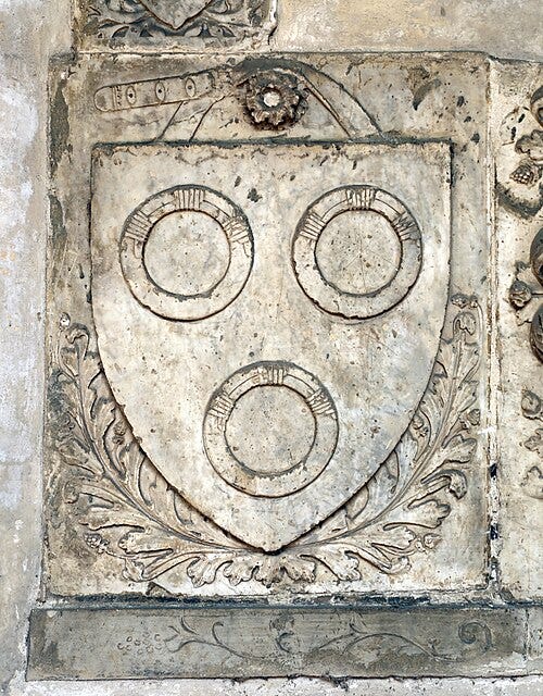 Carved in stone: shield with three circles (Cerchi coat of arms) Carved in stone: shield with three circles (Cerchi coat of arms)