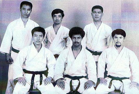 On Coconut Beach, Bomani Sensei and students