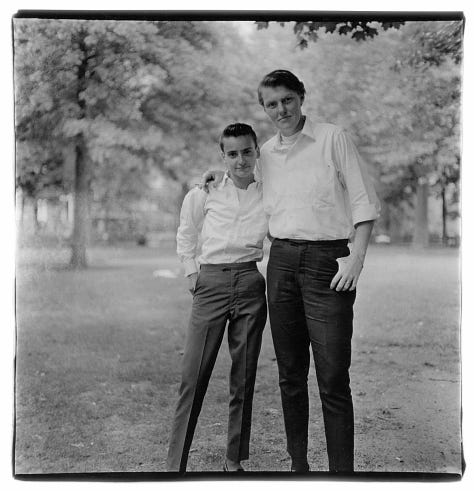 Black and white photographs of people including Susan Sontag and Norman Mailer
