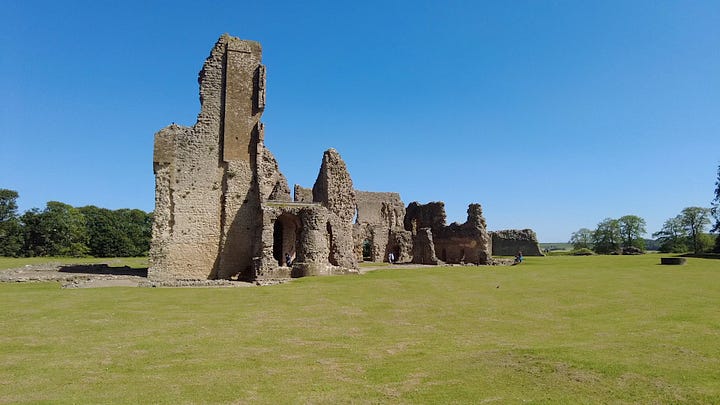 Four photos of the central ruins of Old Sherborne Castle, Dorset. Set against a beautiful, blue and cloudless sky. Part of the Great Tower remains along with walls of the Great Hall and kitchen area.  Images: Roland's Travels