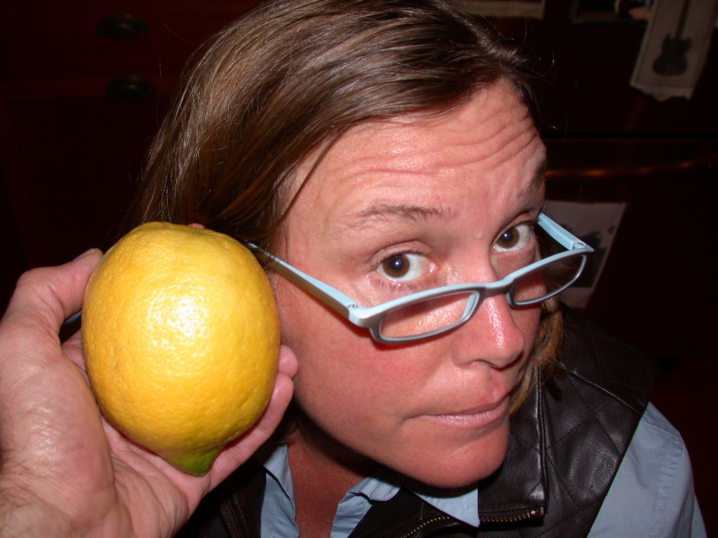 A person holding a lemon

AI-generated content may be incorrect.