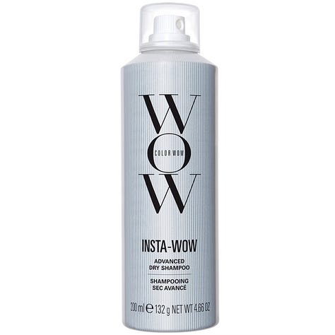 a red lipstick, bottle of hair oil and grey spray can