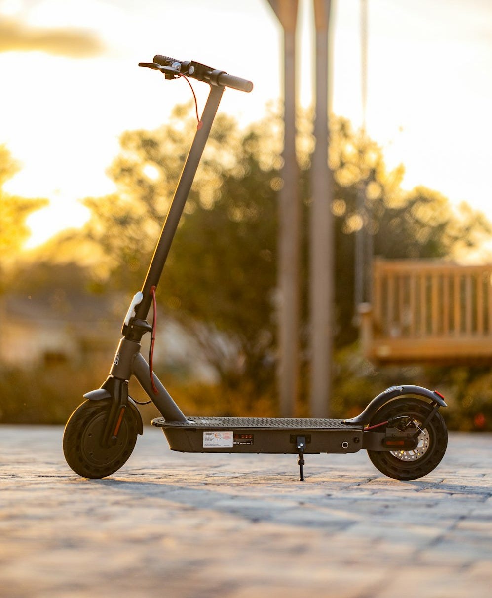 a scooter with a large wheel