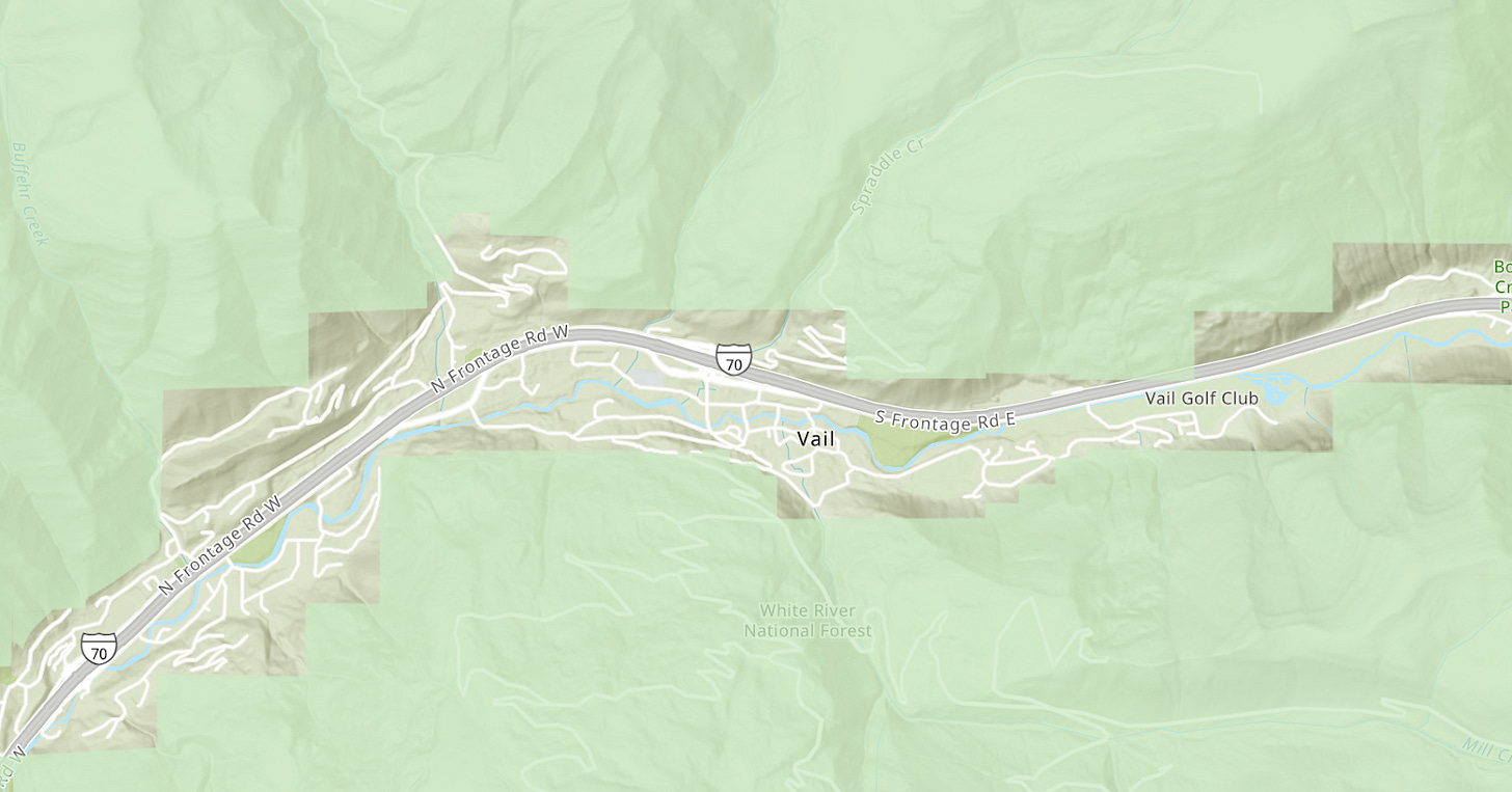 A map of Vail showing that is completely surrounded by National Forest land. A map of Vail showing that is completely surrounded by National Forest land.