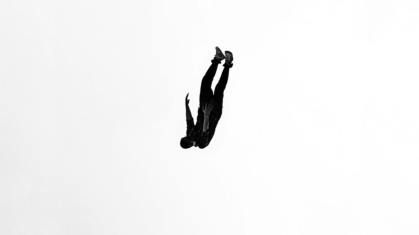 Young man falling from a great height.