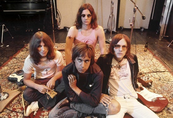 LOS ANGELES - MAY 23: Iggy the Stooges (L-R Dave Alexander, Iggy Pop in front, Scott Asheton in back and Ron Asheton) pose for a portrait at Elektra Sound Recorders while making their second album 'Fun House' on May 23, 1970 in Los Angeles, California. (Photo by Ed Caraeff/Getty Images) LOS ANGELES - MAY 23: Iggy the Stooges (L-R Dave Alexander, Iggy Pop in front, Scott Asheton in back and Ron Asheton) pose for a portrait at Elektra Sound Recorders while making their second album 'Fun House' on May 23, 1970 in Los Angeles, California. (Photo by Ed Caraeff/Getty Images)