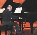 A person playing a piano

AI-generated content may be incorrect.