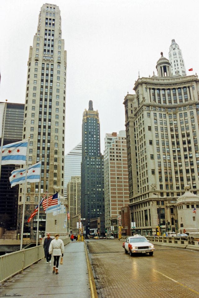 Michigan Avenue looking south from the Chicago River Bridge, showcasing landmark skyscrapers: 333 N. Michigan Avenue, Carbide & Carbon, and London Guarantee Buildings (L-R), February 1996. Michigan Avenue looking south from the Chicago River Bridge, showcasing landmark skyscrapers: 333 N. Michigan Avenue, Carbide & Carbon, and London Guarantee Buildings (L-R), February 1996.
