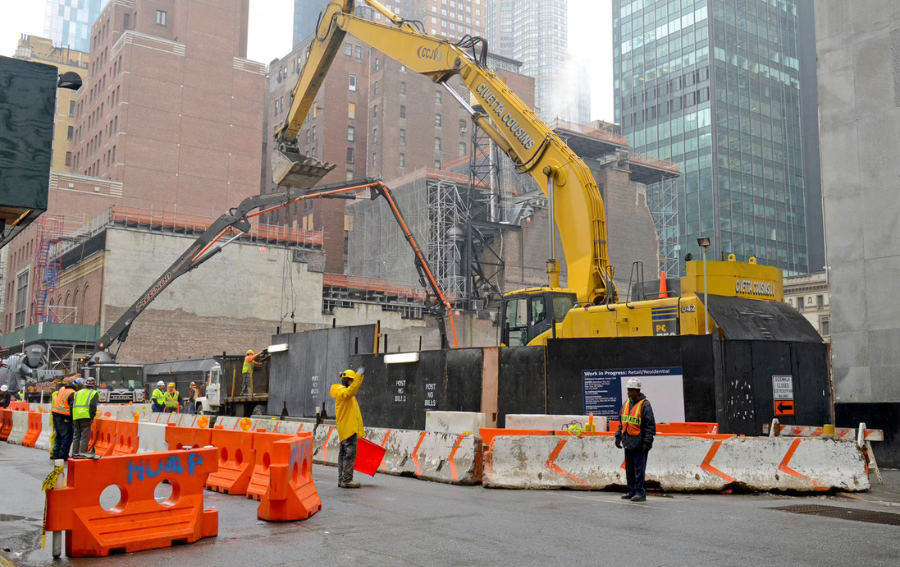 A yellow crane doing construction in New York