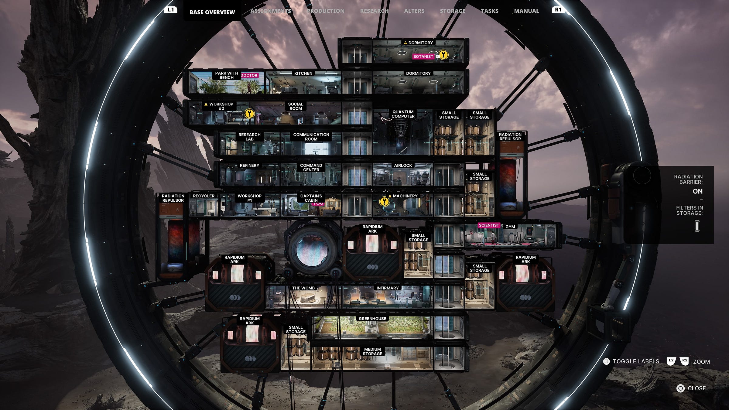 Video game screenshot of a multi-story base made of rooms set inside a giant wheel. The rumors are labeled. Some include a dormitory, a command center and a greenhouse.