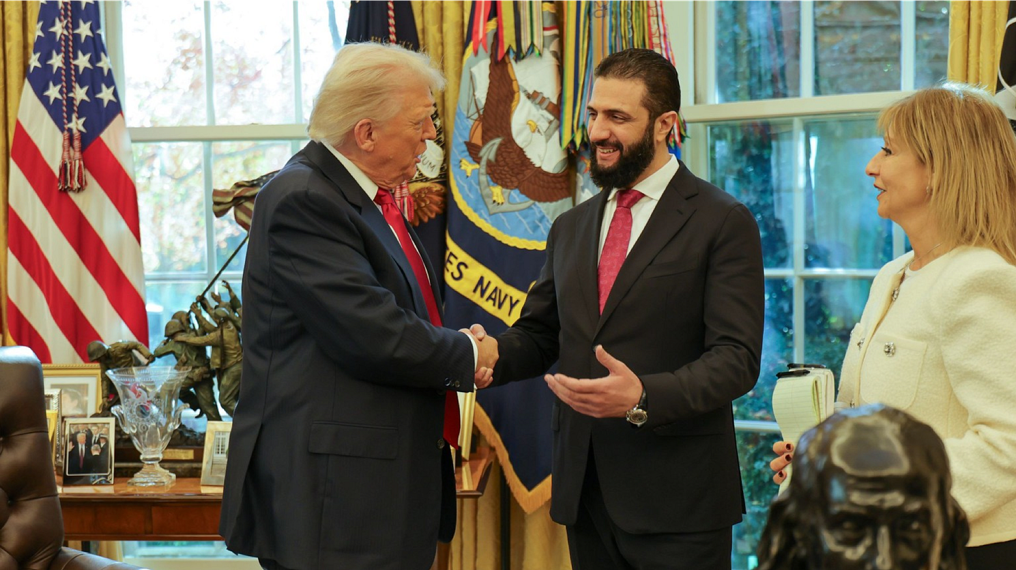 President Donald Trump, left, shakes hands with Syria’s President Ahmad al-Sharaa, at the White House. Credit: Syrian Presidency Press Office.