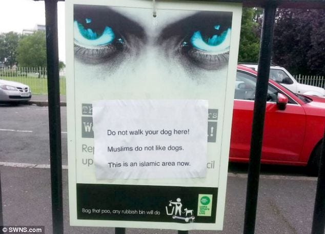 An MP complained after a sign posted near a park warned dog-walkers to stay out of 'Islamic areas'