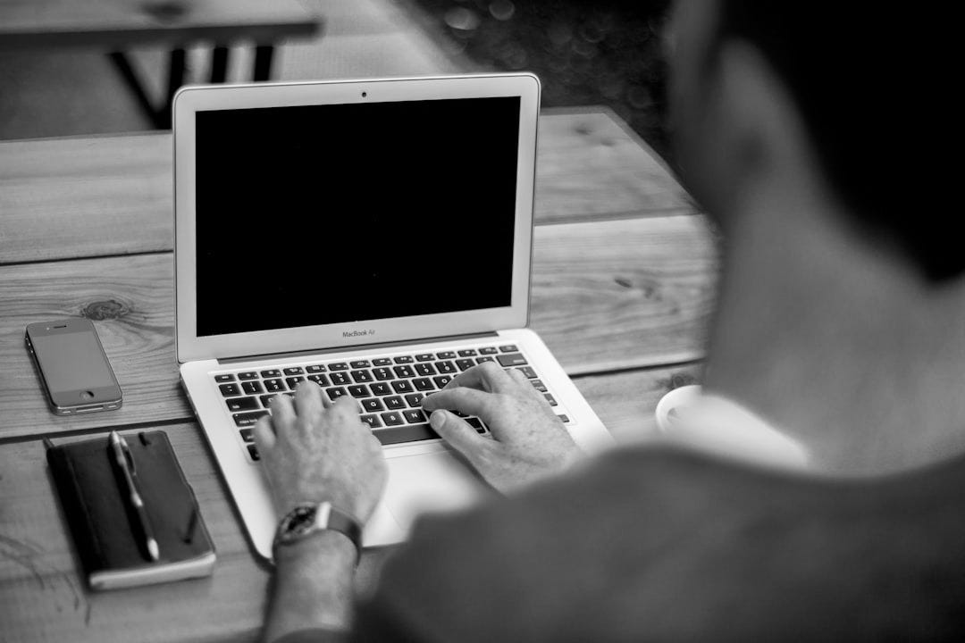 man using MacBook Air man using MacBook Air